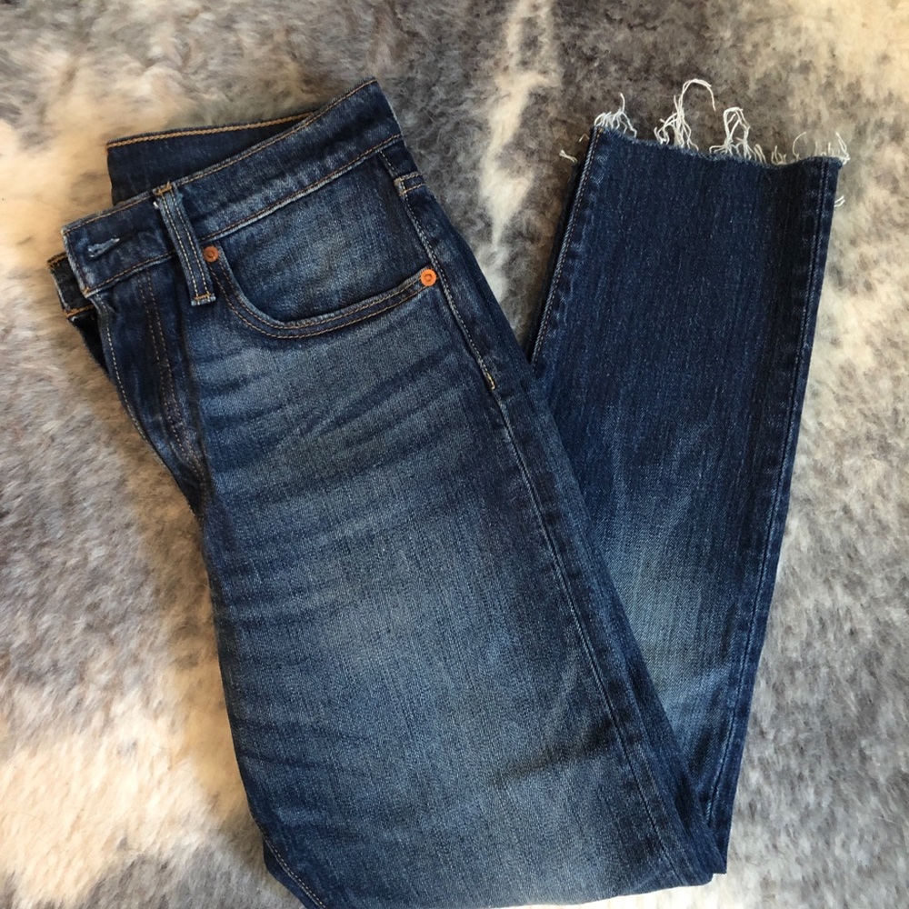 Like new! Levi’s 501 med-dark wash raw hem jeans